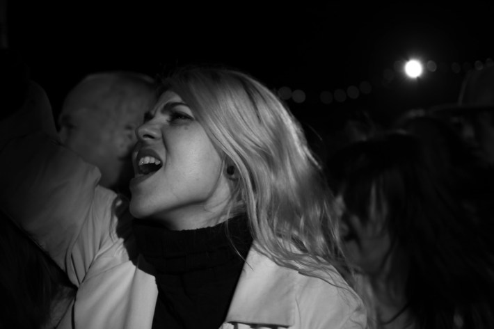 yelling lady in a crowd